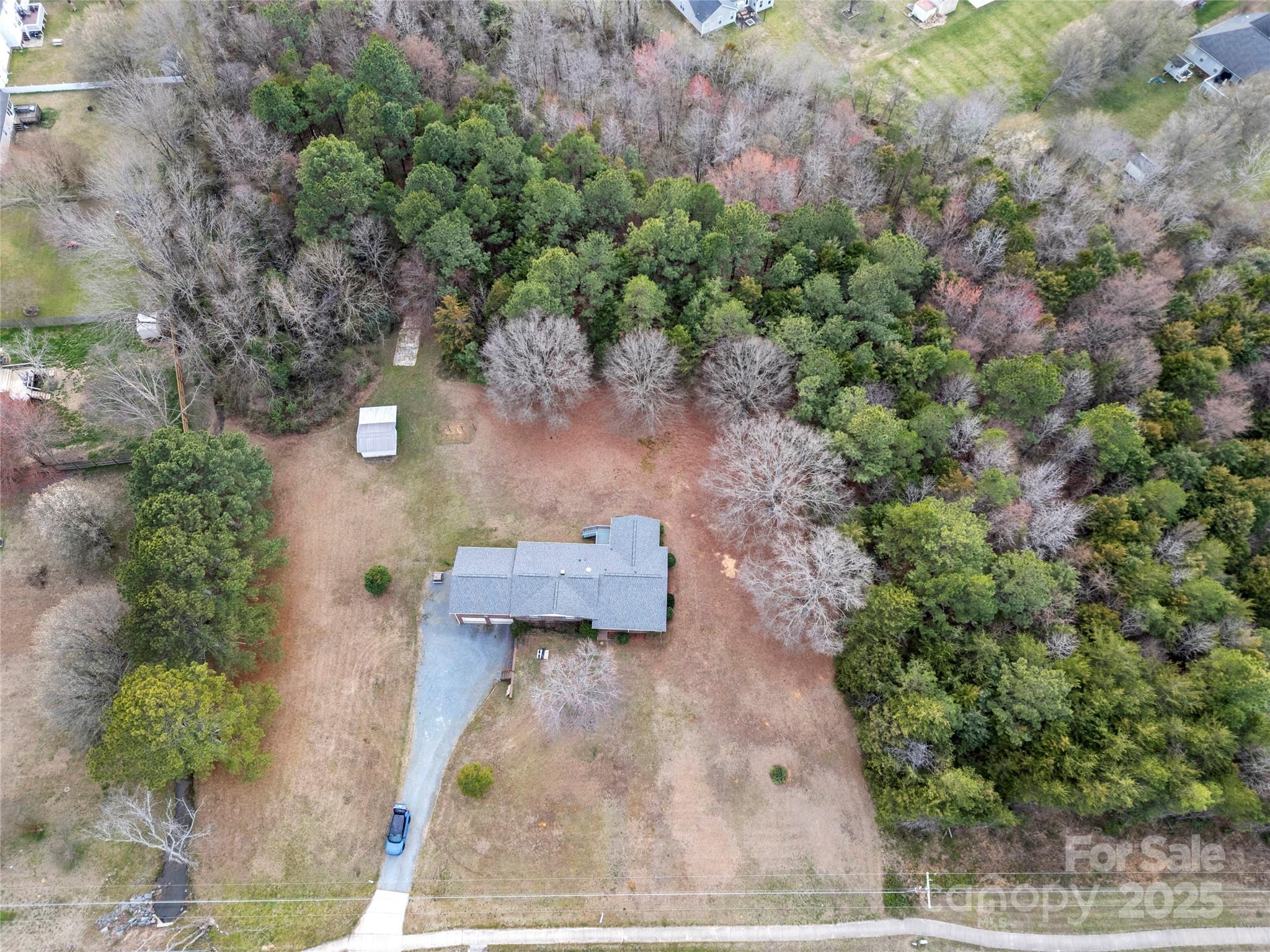 5303 Rogers Road Monroe, NC 28110 - Photo 43 of 45 an aerial view of a house with a yard