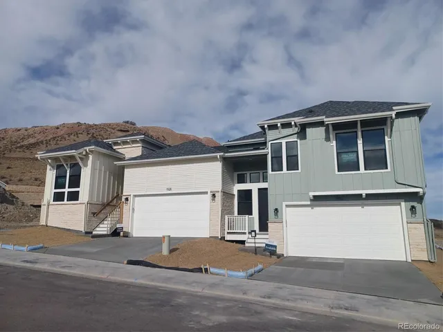 a view of a house with a parking space