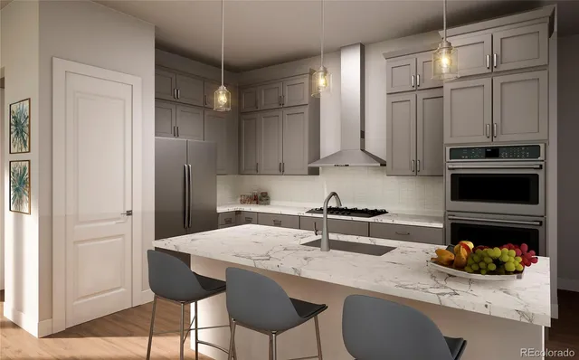 a kitchen with stainless steel appliances a sink and cabinets