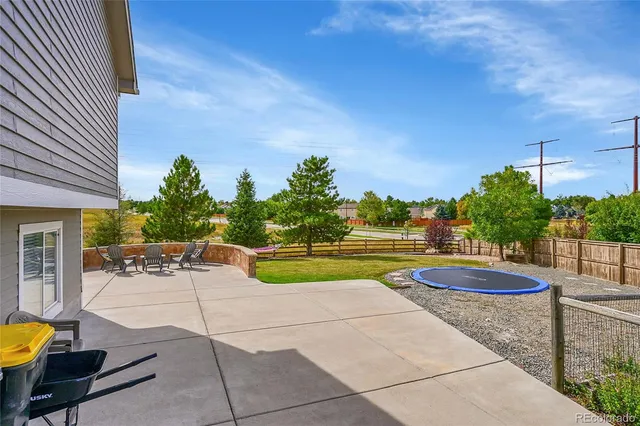 a view of a swimming pool with a lounge chairs