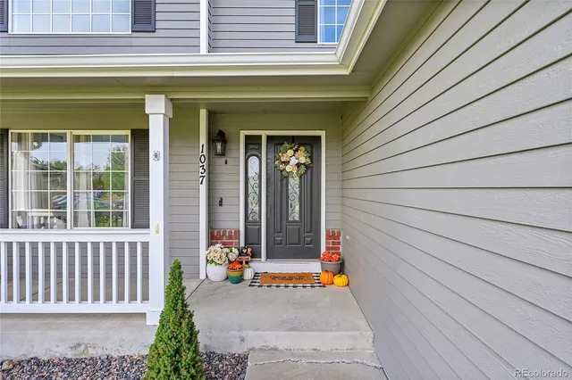 a front view of a house with a porch