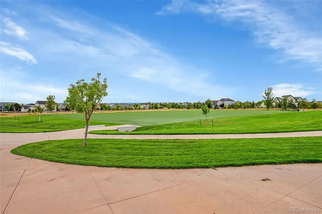 a view of a park with swings