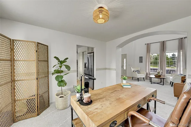 a view of a dining room with furniture