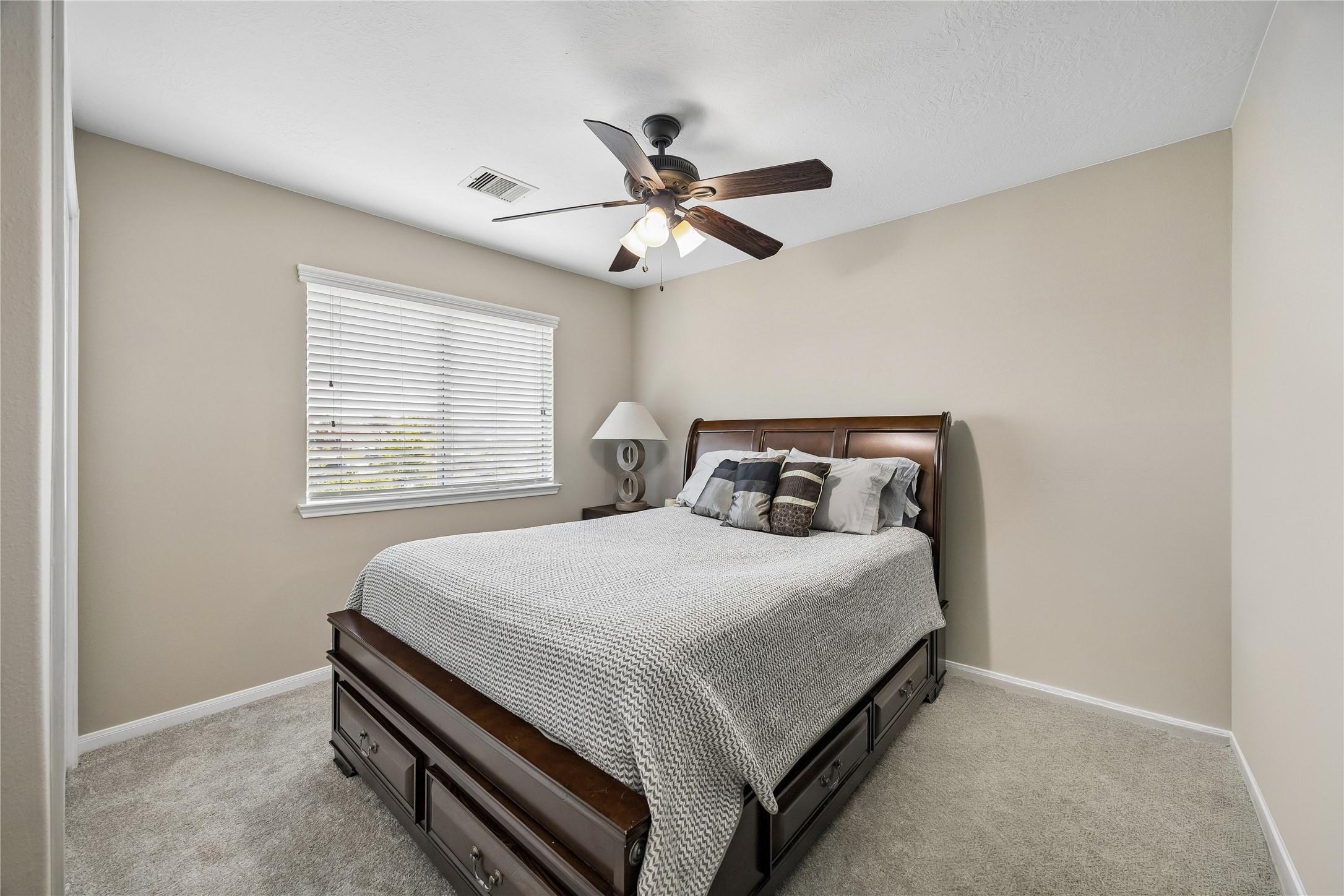 8433 Sunset Loch Drive Spring, TX 77379 - Photo 19 of 25 a bedroom with a bed and window