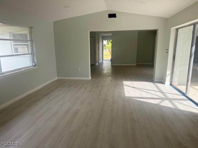 16320 Arbor Ridge Drive Fort Myers, FL 33908 - Photo 15 of 20 an empty room with wooden floor and windows