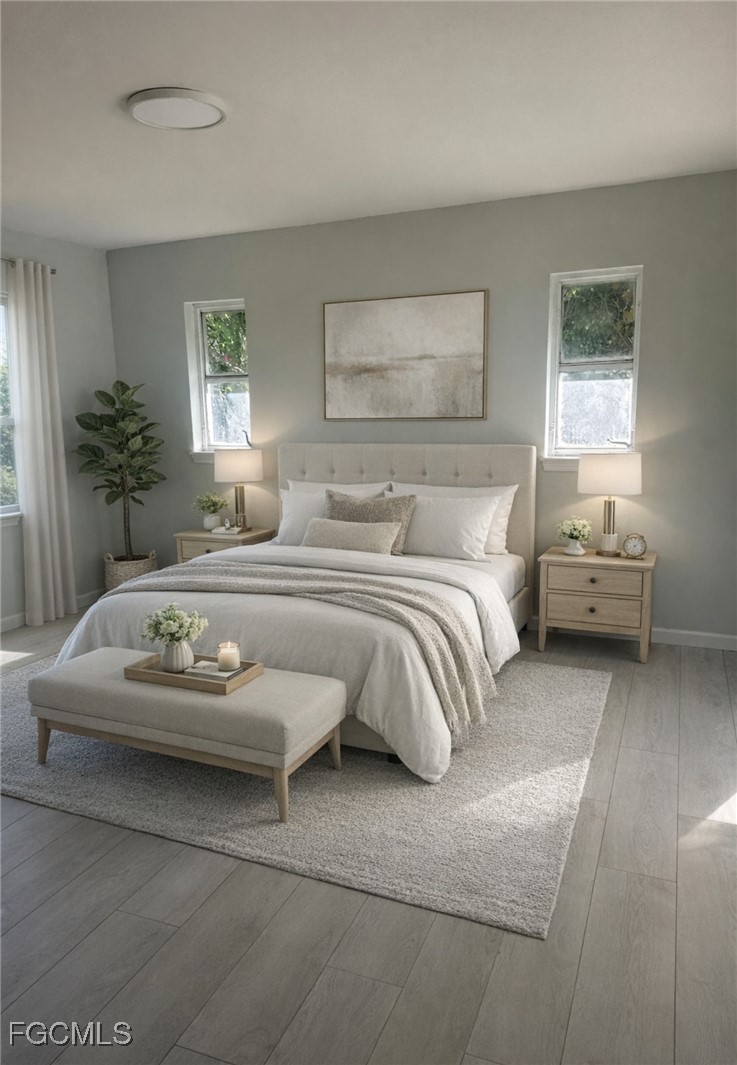 16320 Arbor Ridge Drive Fort Myers, FL 33908 - Photo 19 of 20 a bedroom with furniture and a window