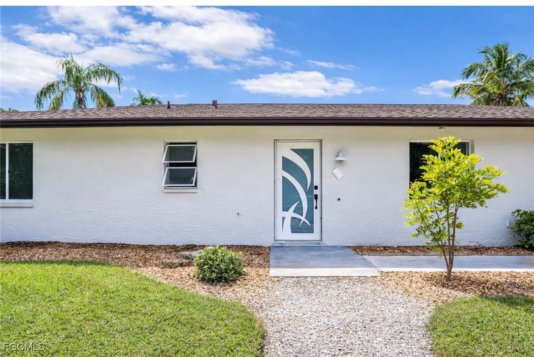 16320 Arbor Ridge Drive Fort Myers, FL 33908 - Photo 4 of 20 a front view of house with yard