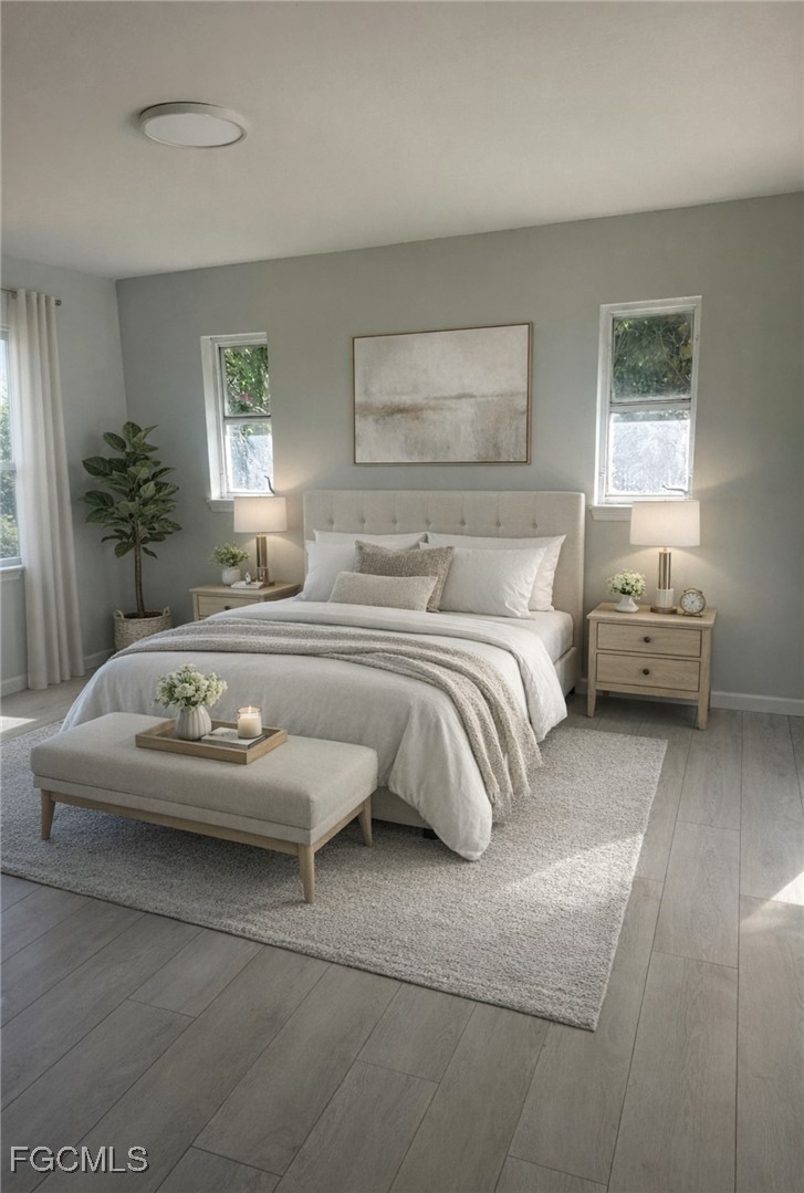 16320 Arbor Ridge Drive Fort Myers, FL 33908 - Photo 9 of 20 a bedroom with bed and a window