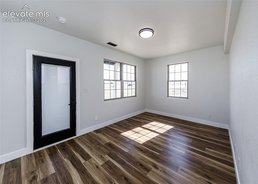 1120 Newton Road Pueblo, CO 81005 - Photo 29 of 46 a view of an empty room and window