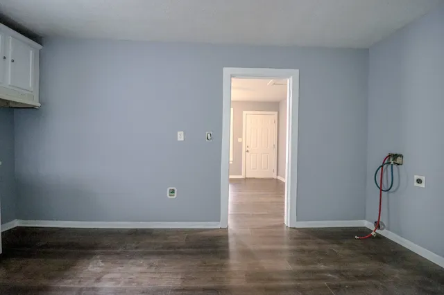 a view of room with gym equipment