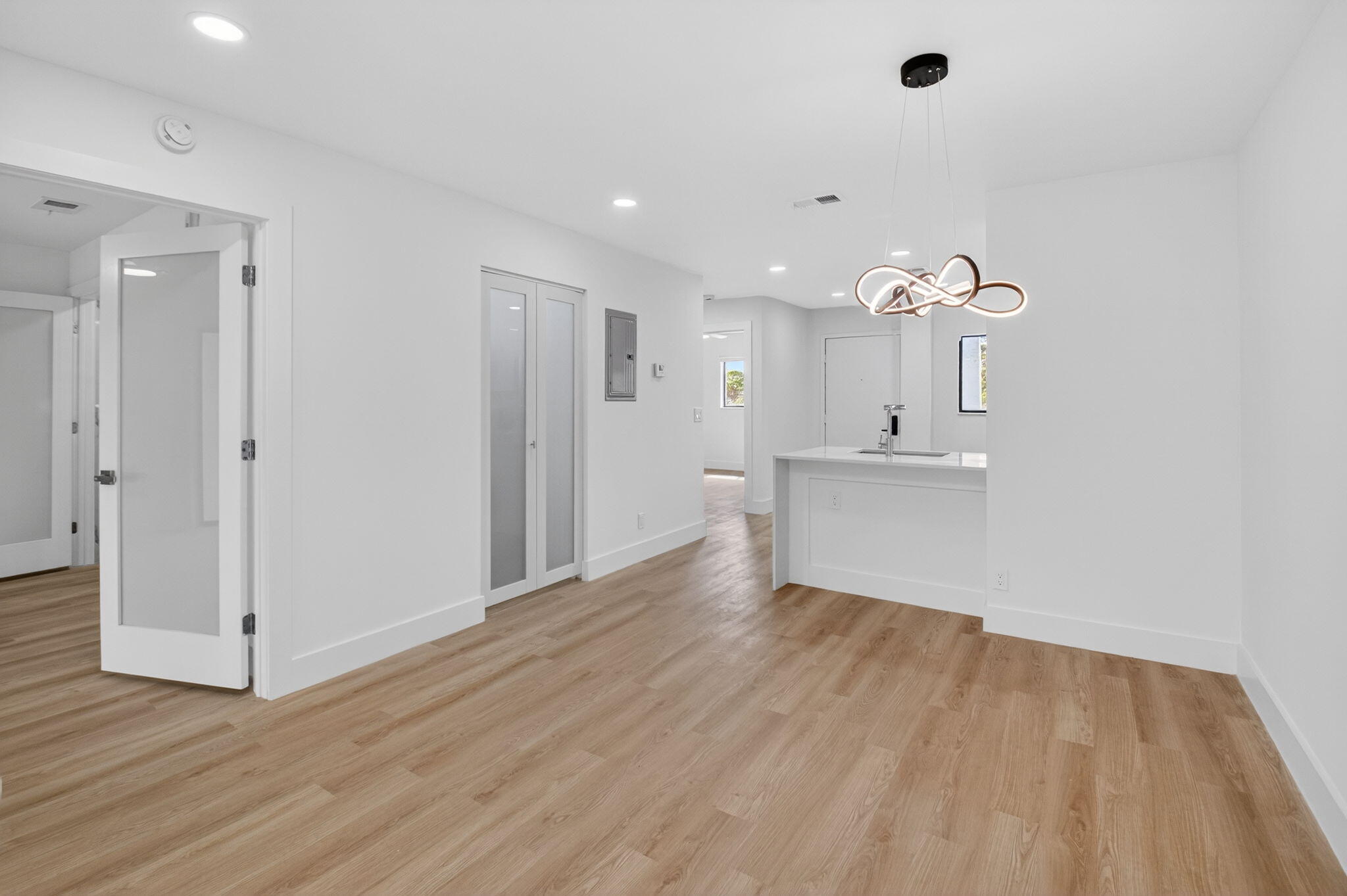 300 West Hidden Valley Boulevard, Unit 308 Boca Raton, FL 33487 - Photo 17 of 39 a view of an empty room with wooden floor and a window
