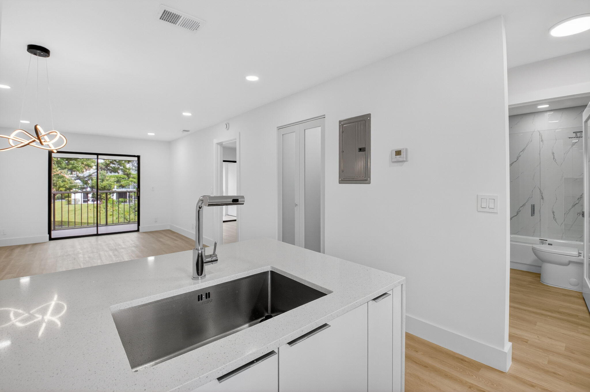 300 West Hidden Valley Boulevard, Unit 308 Boca Raton, FL 33487 - Photo 9 of 39 a bathroom with a sink a toilet and shower