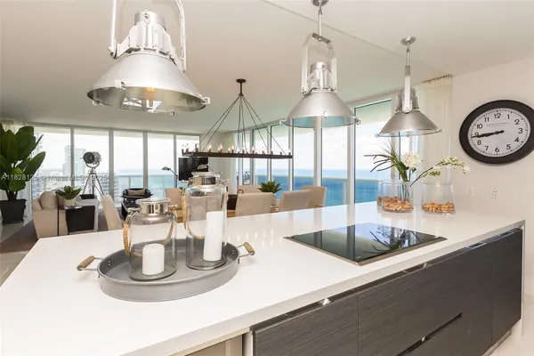 a view of a dining room with furniture window and outside view