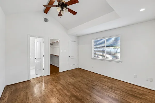 wooden floor in a room with a window