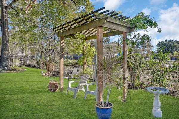 a backyard of a house with lots of green space