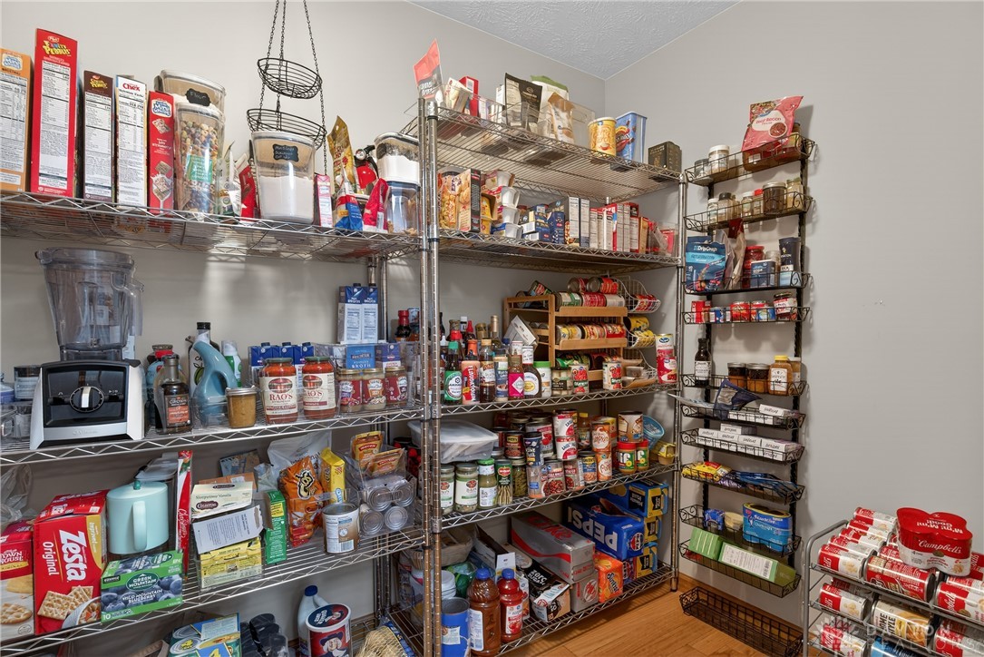 5264 Frazier-Guy Road Sidney, OH 45365 - Photo 16 of 51 This spacious pantry provides abundant storage, ensuring all your culinary essentials are neatly organized and accessible.