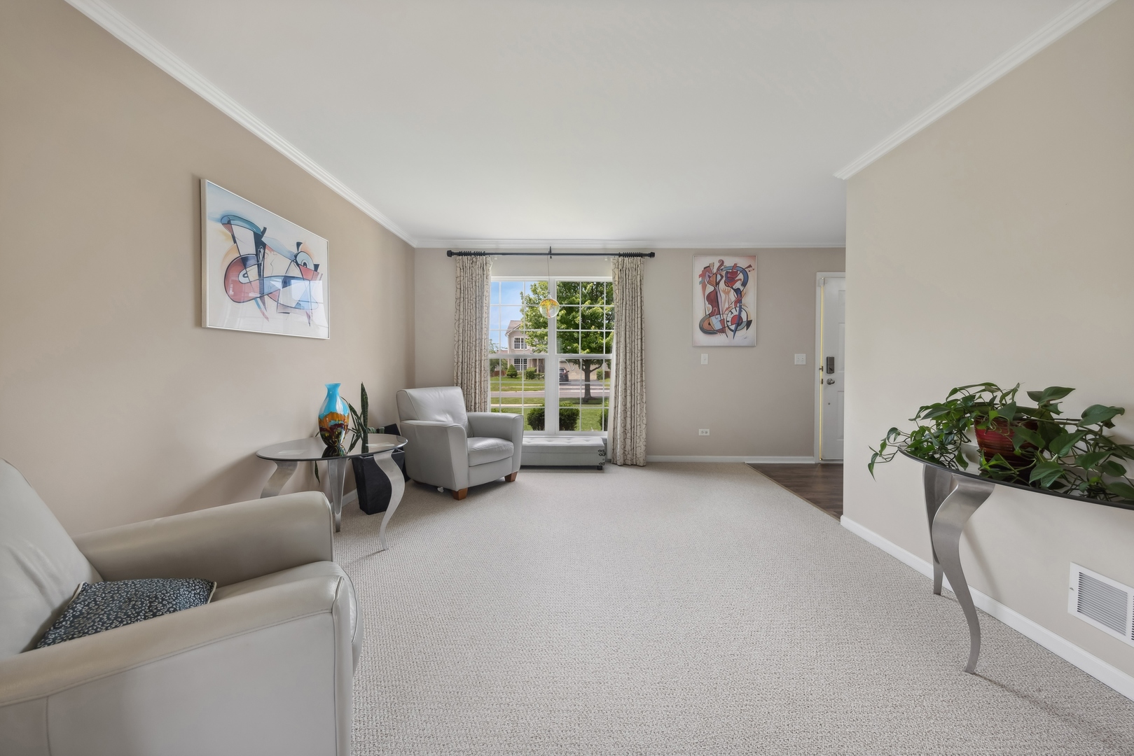 373 Foster Way Bolingbrook, IL 60440 - Photo 11 of 35 a living room with furniture and a potted plant