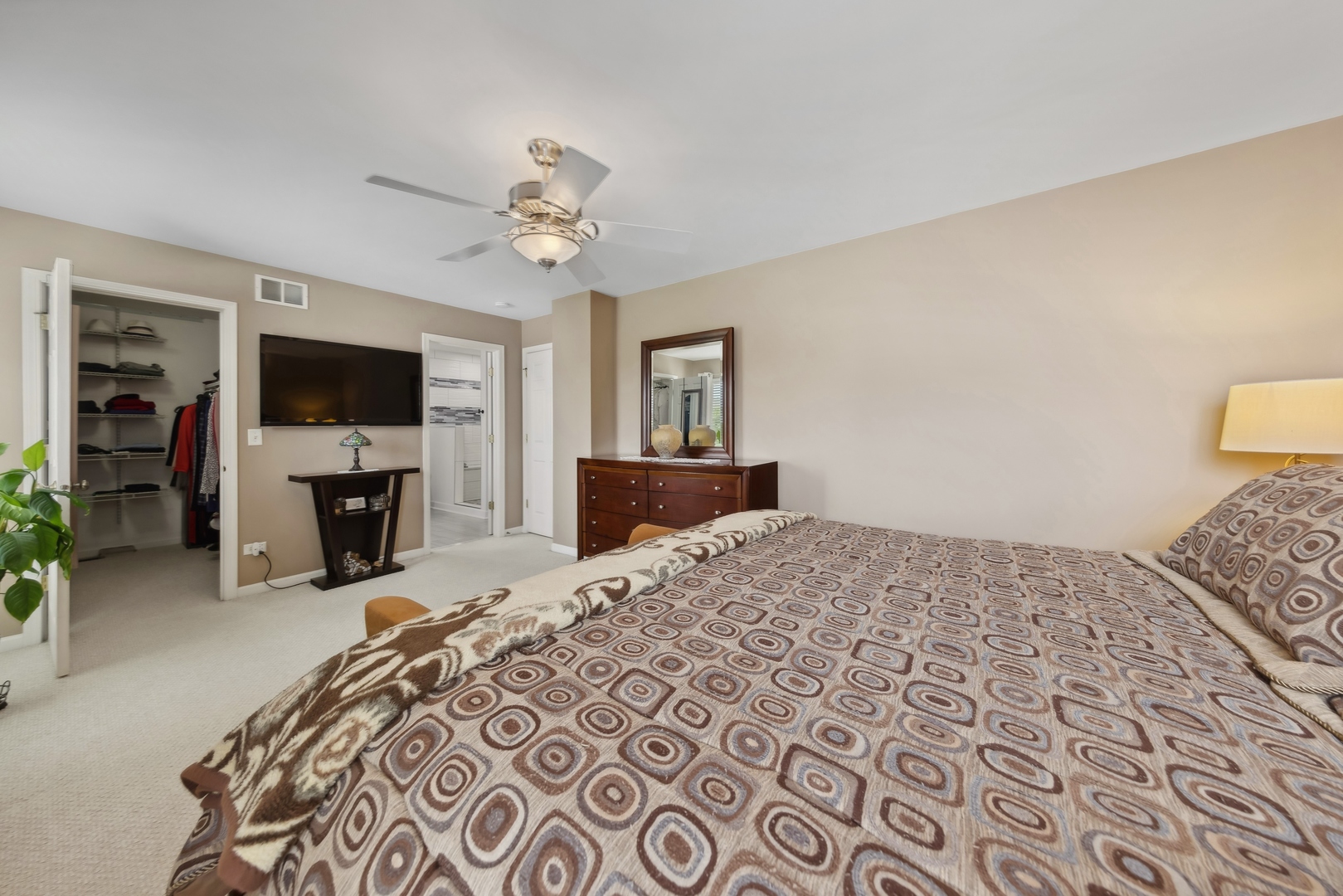 373 Foster Way Bolingbrook, IL 60440 - Photo 17 of 35 a bedroom with a bed and a flat screen tv