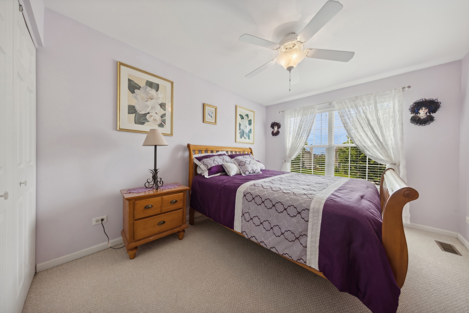 373 Foster Way Bolingbrook, IL 60440 - Photo 21 of 35 a bedroom with a bed and a chandelier