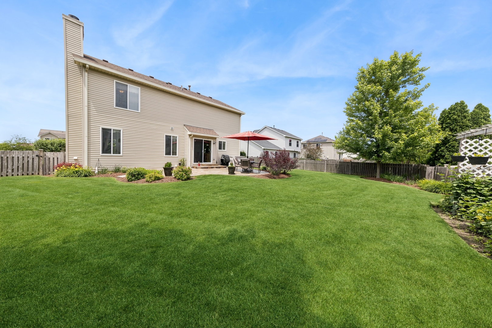 373 Foster Way Bolingbrook, IL 60440 - Photo 29 of 35 a view of a house with a yard and sitting area