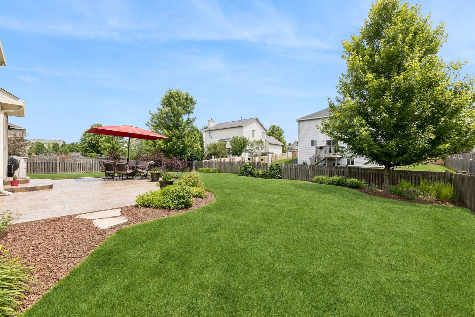 373 Foster Way Bolingbrook, IL 60440 - Photo 30 of 35 a view of a house with a garden and pathway