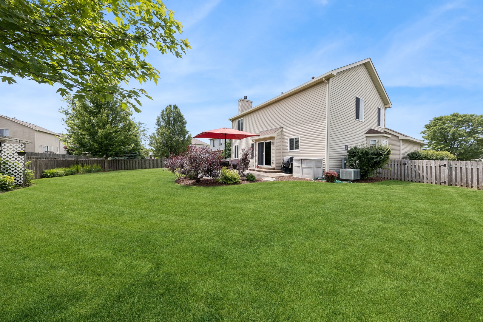 373 Foster Way Bolingbrook, IL 60440 - Photo 31 of 35 a front view of house with garden and trees