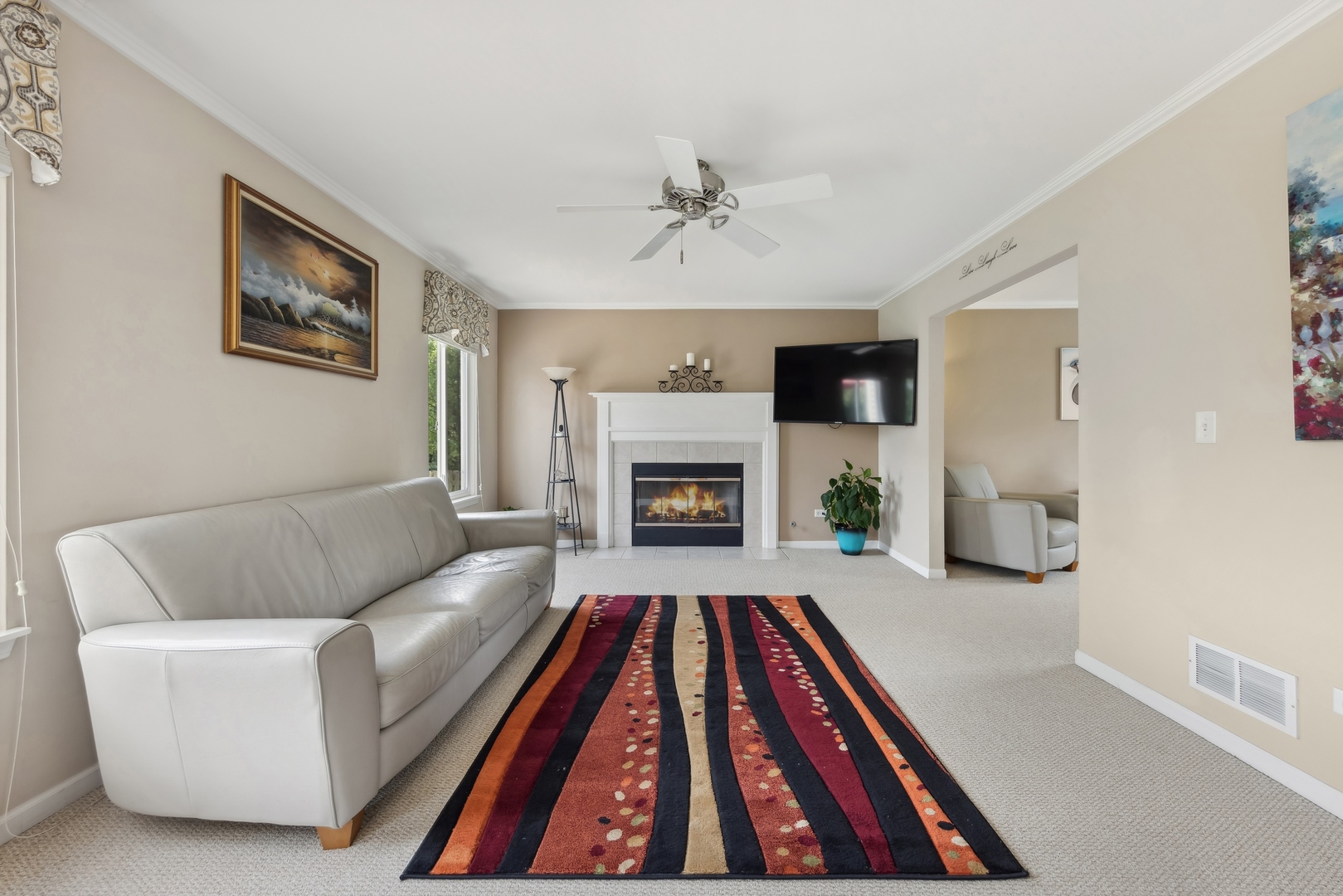 373 Foster Way Bolingbrook, IL 60440 - Photo 9 of 35 a living room with furniture and a fireplace