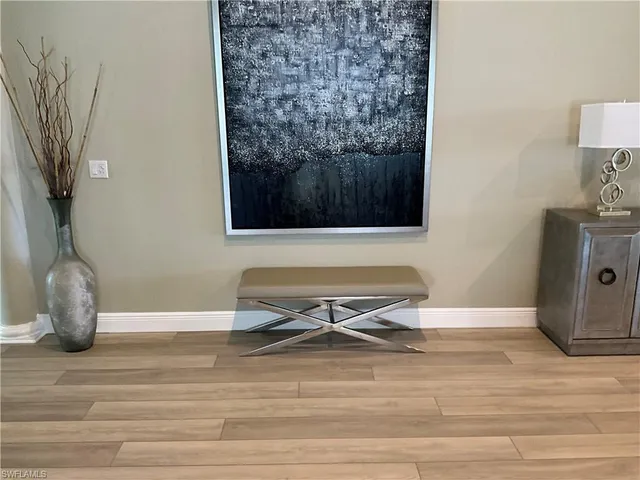 a bench sitting in the middle of a room