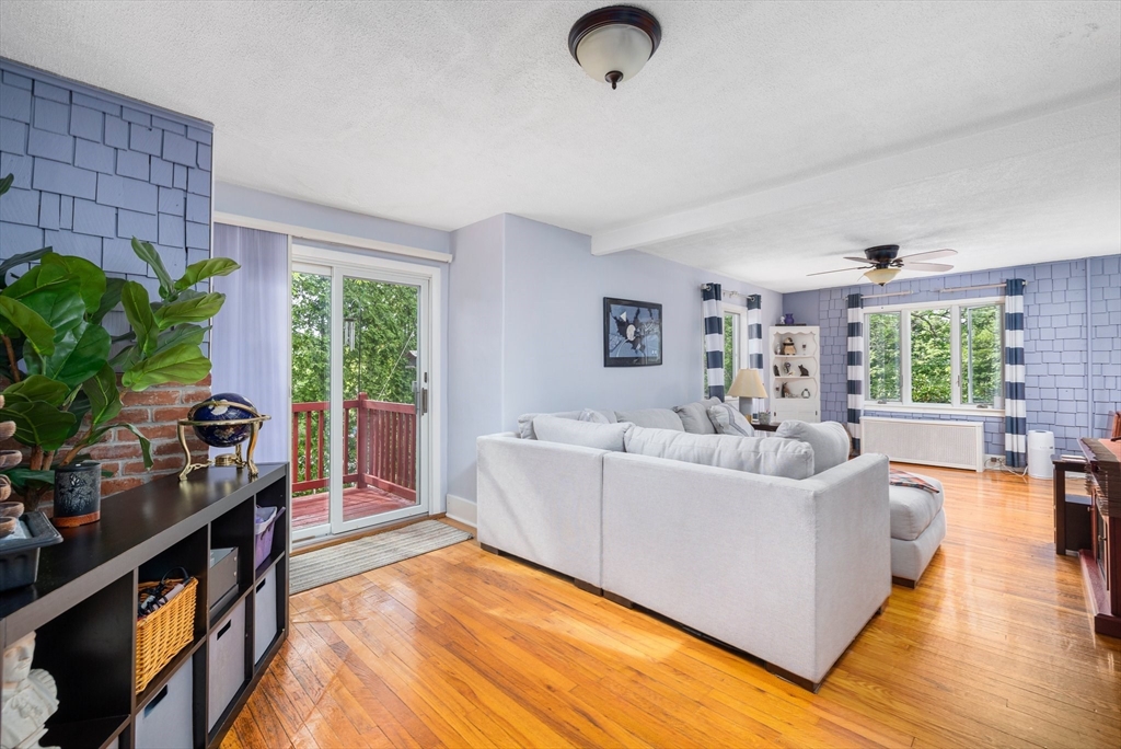 31 Tyson Road Worcester, MA 01606 - Photo 12 of 27 a living room with furniture and a flat screen tv