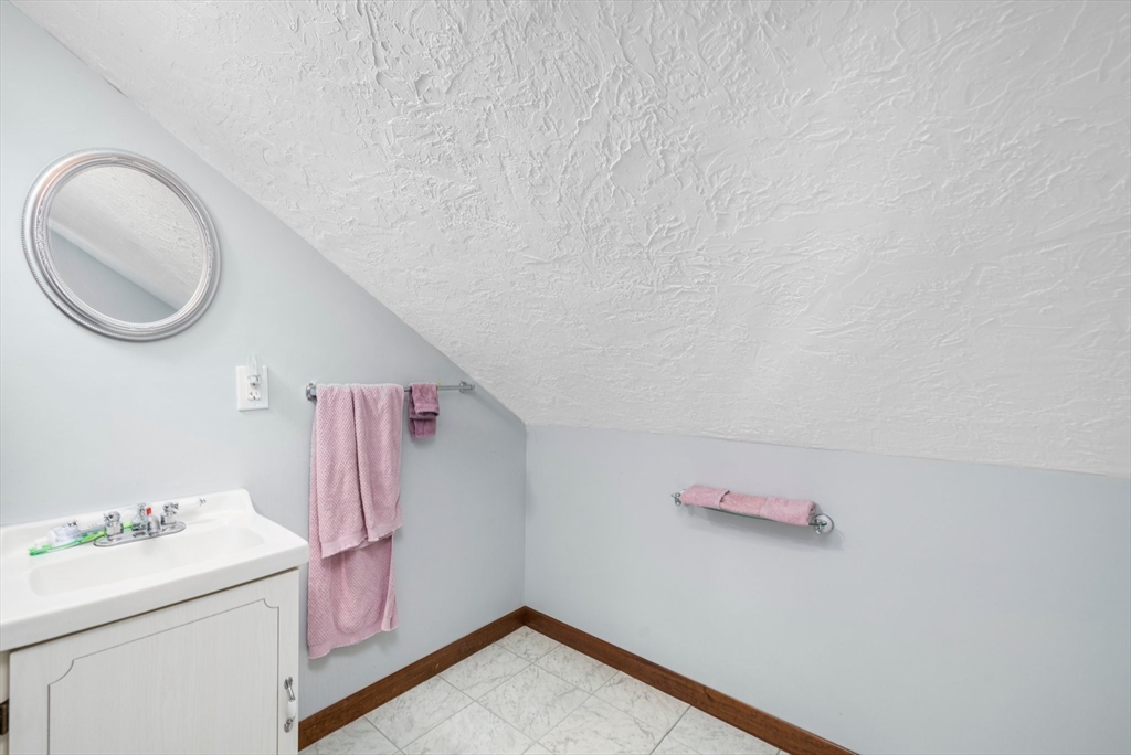 31 Tyson Road Worcester, MA 01606 - Photo 16 of 27 a storage room with a washer and dryer