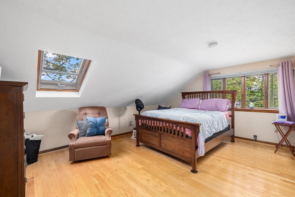 31 Tyson Road Worcester, MA 01606 - Photo 18 of 27 a bedroom with a bed and window