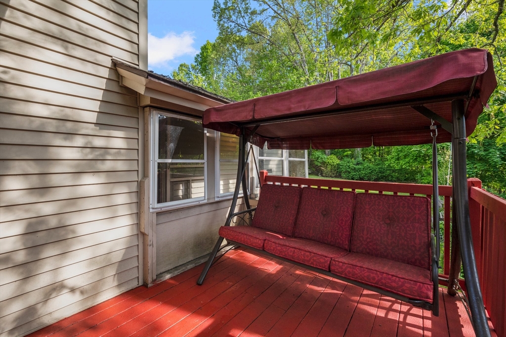 31 Tyson Road Worcester, MA 01606 - Photo 22 of 27 a wooden bench sitting in front of a building