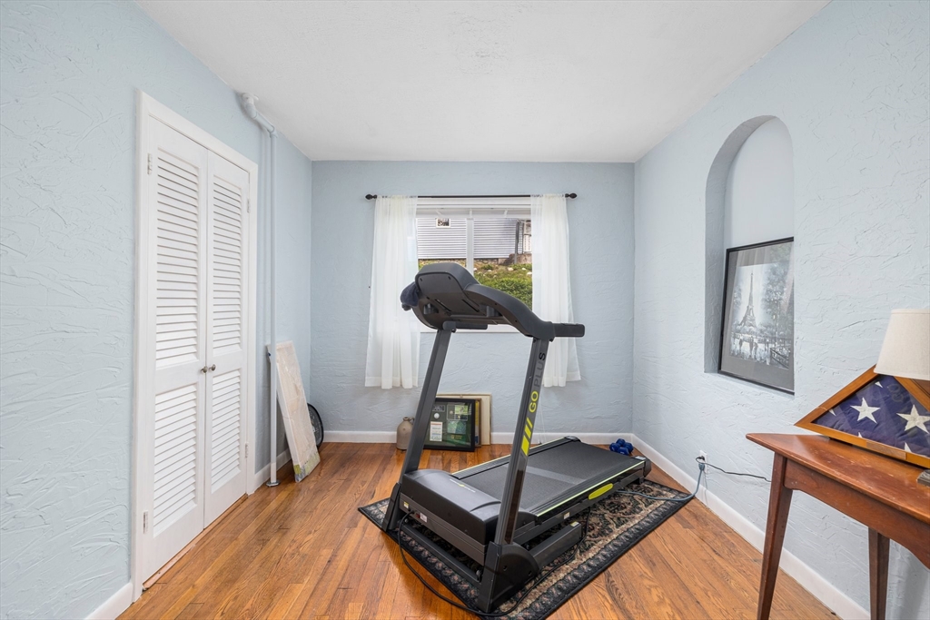 31 Tyson Road Worcester, MA 01606 - Photo 7 of 27 a living room with furniture and a wooden floor