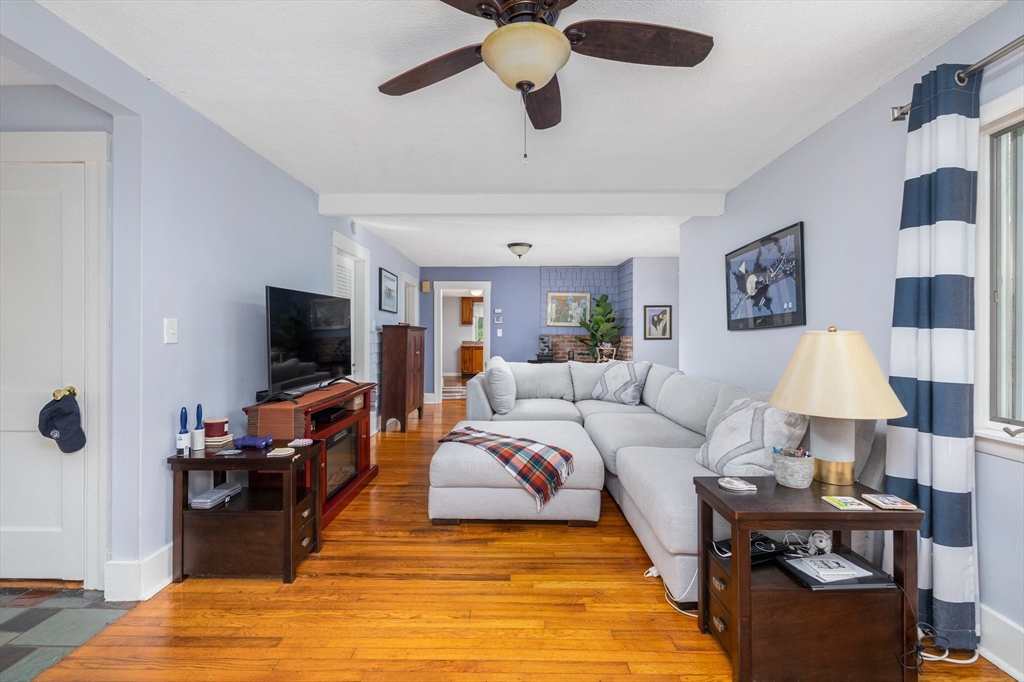 31 Tyson Road Worcester, MA 01606 - Photo 9 of 27 a living room with furniture and a flat screen tv