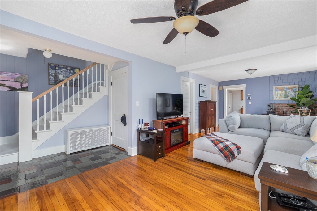 31 Tyson Road Worcester, MA 01606 - Photo 10 of 27 a living room with furniture and a flat screen tv