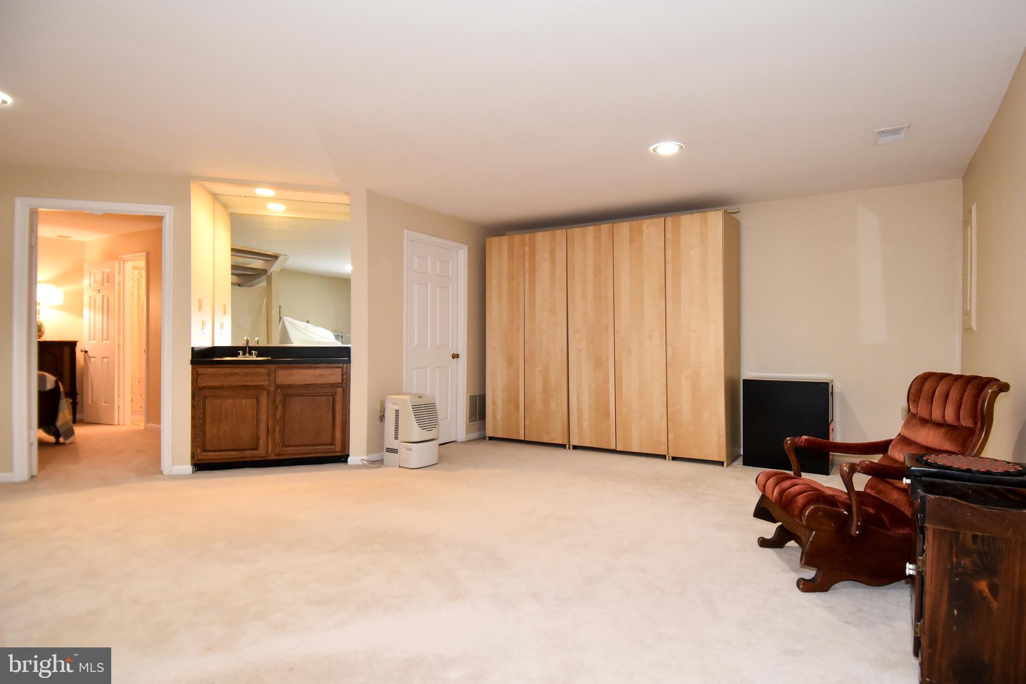 11988 Sentinel Point Court Reston, VA 20191 - Photo 46 of 54 Basement With Wet Bar