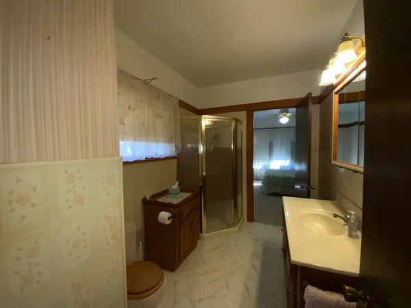 a bathroom with a sink and mirror