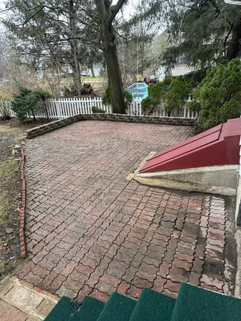 a view of a backyard of the house