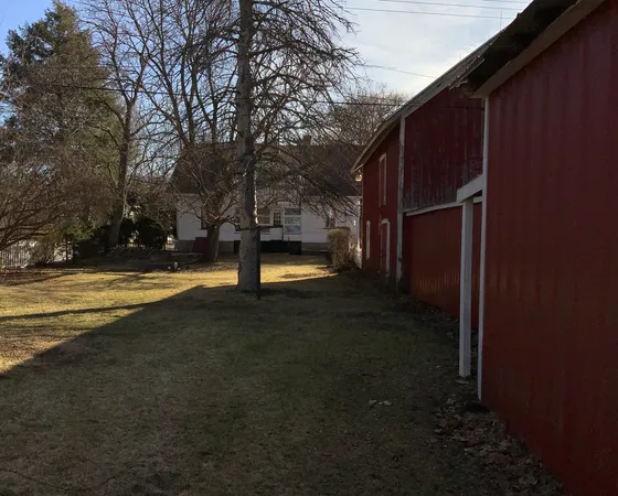 a house with trees in front of it