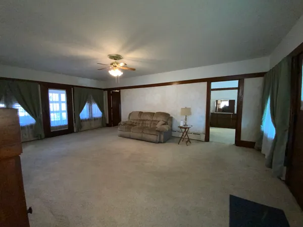 a living room with furniture and a window