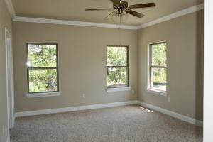 131 Wayne Trail Santa Rosa Beach, FL 32459 - Photo 5 of 15 an empty room with a window and a fan