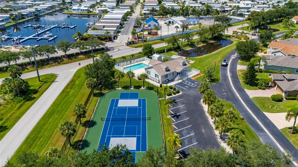 24604 Rio Villa Lakes Circle Punta Gorda, FL 33950 - Photo 24 of 28 an aerial view of residential houses with outdoor space
