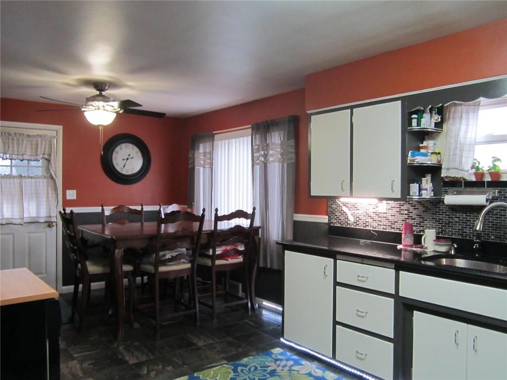 213 Donnell Road Lower Burrell, PA 15068 - Photo 5 of 25 Kitchen features beautifully updated granite counter and backsplash!
