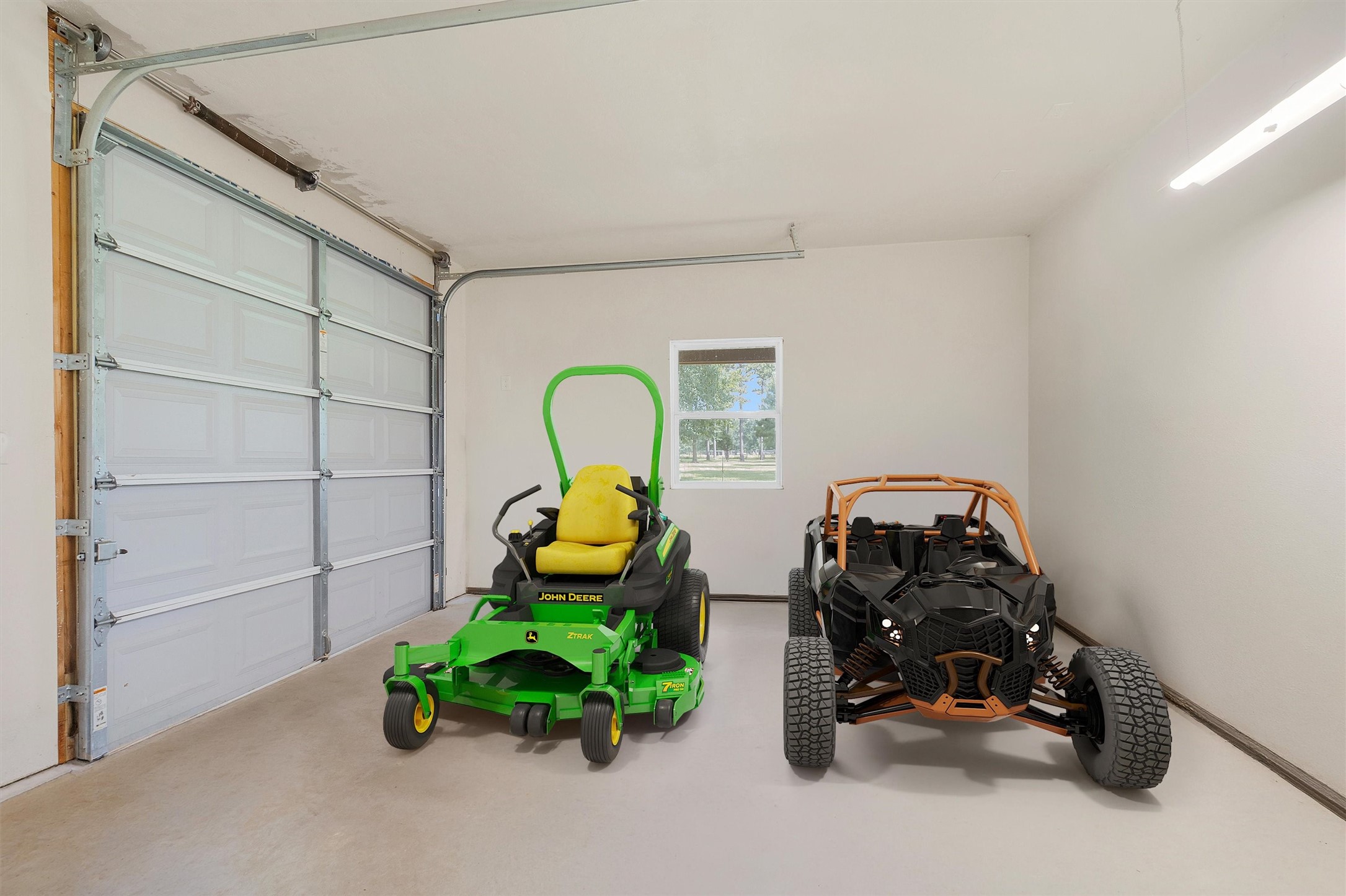 9321 North Walker Road Cleveland, TX 77328 - Photo 34 of 49 Additional flex space w/AC--Makes a great workshop, tack room. or even storage for your mower or ATV with a 3rd garage door entry/exit