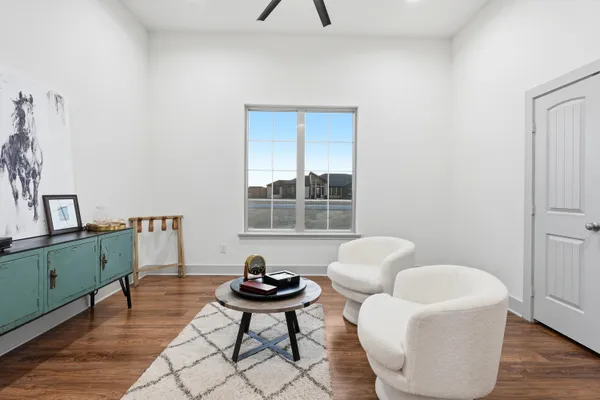 a living room with furniture and a window