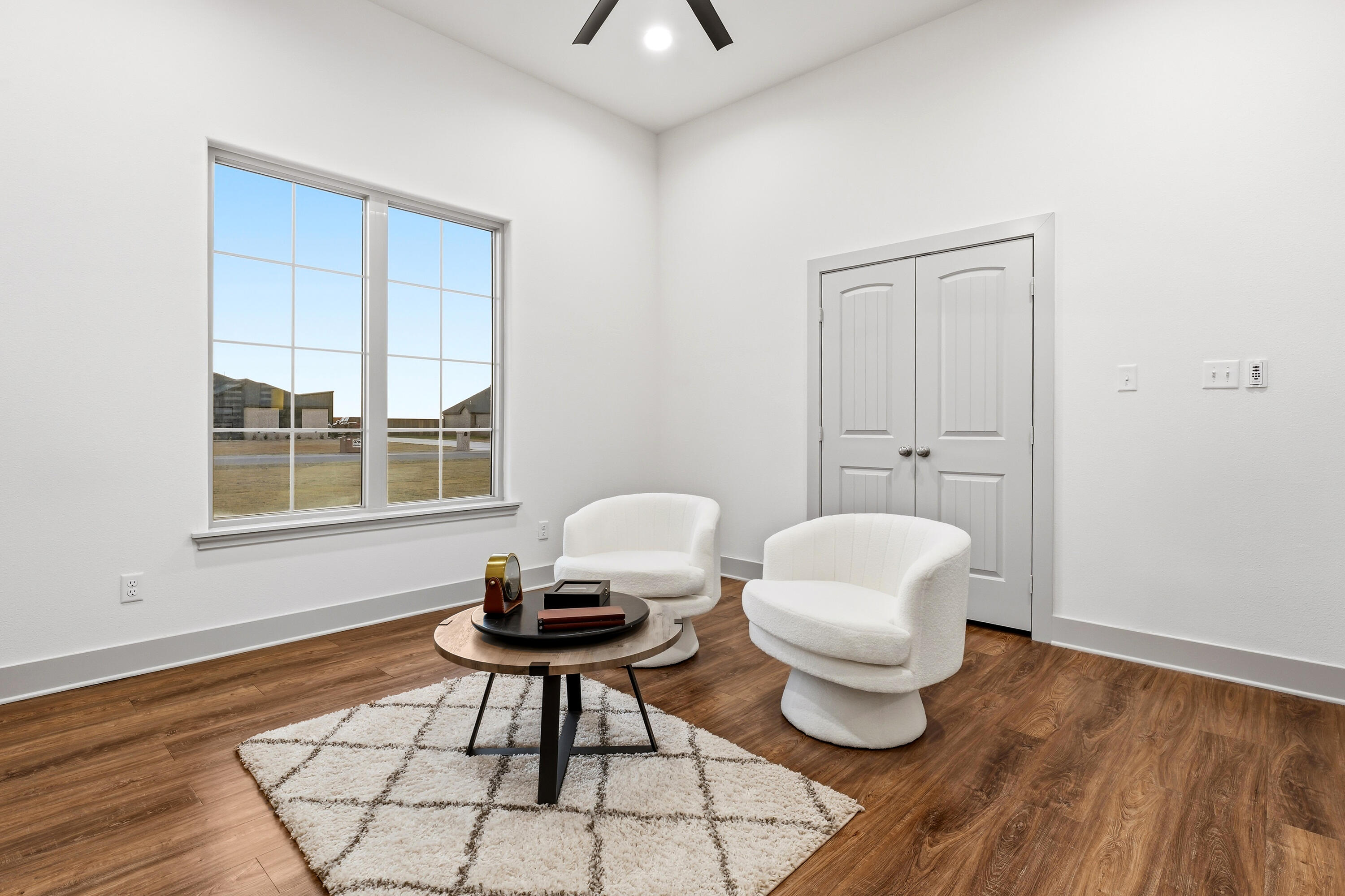 19215 County Road 2240 Lubbock, TX 79423 - Photo 13 of 36 a living room with furniture and a window