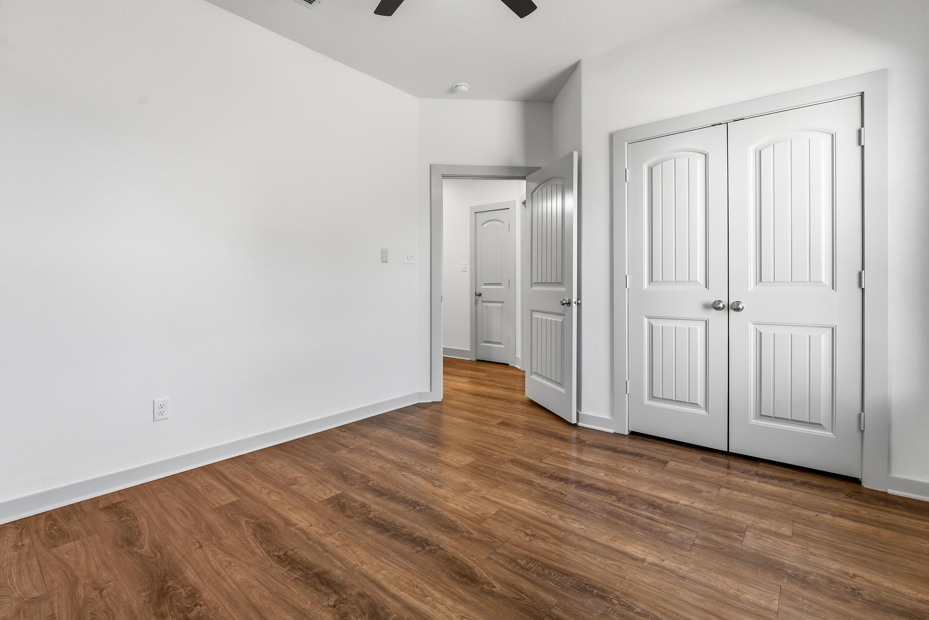 19215 County Road 2240 Lubbock, TX 79423 - Photo 24 of 36 a view of empty room with wooden floor