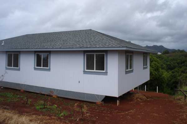 4849 Lani Road Kapaa, HI 96746 - Photo 1 of 8 a front view of a house with yard