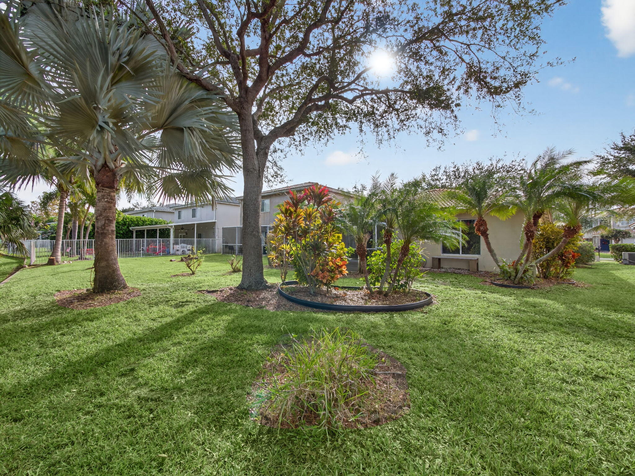 4358 Southeast Graham Drive Stuart, FL 34997 - Photo 27 of 34 a view of a garden with a tree