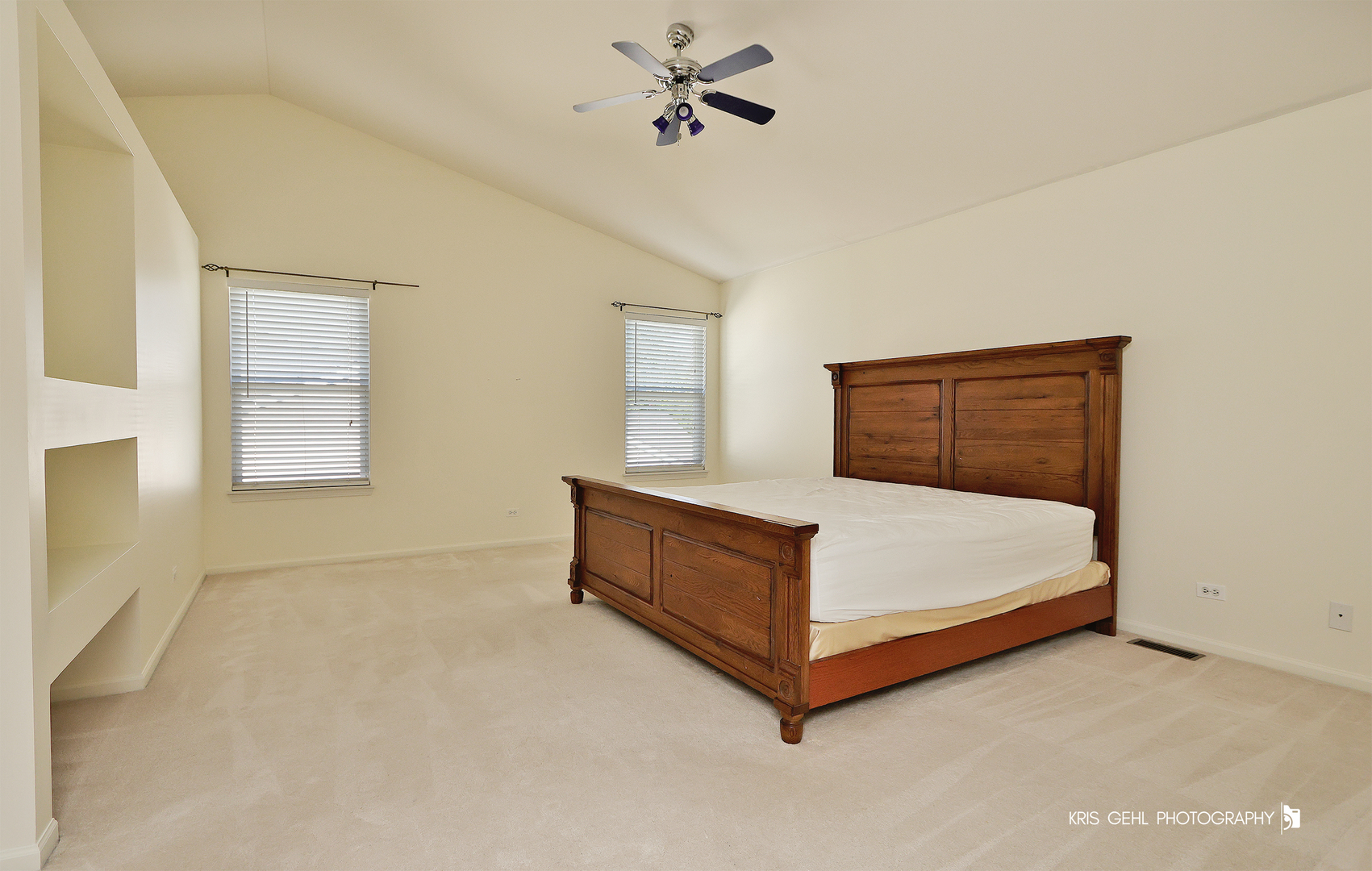 25619 West Bluestem Road Round Lake, IL 60073 - Photo 15 of 33 a spacious bedroom with a bed and window